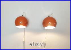 Pair of mid century atomic eyeball lamps, orange globe lights. Scandinavian