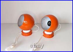 Pair of mid century atomic eyeball lamps, orange globe lights. Scandinavian