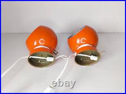 Pair of mid century atomic eyeball lamps, orange globe lights. Scandinavian