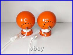 Pair of mid century atomic eyeball lamps, orange globe lights. Scandinavian