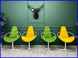 Set of four Vintage Mid century Atomic Space Age Chrome swivel dining chairs
