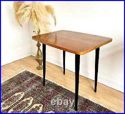 Vintage mid century modern wooden side table with black atomic legs 1970s